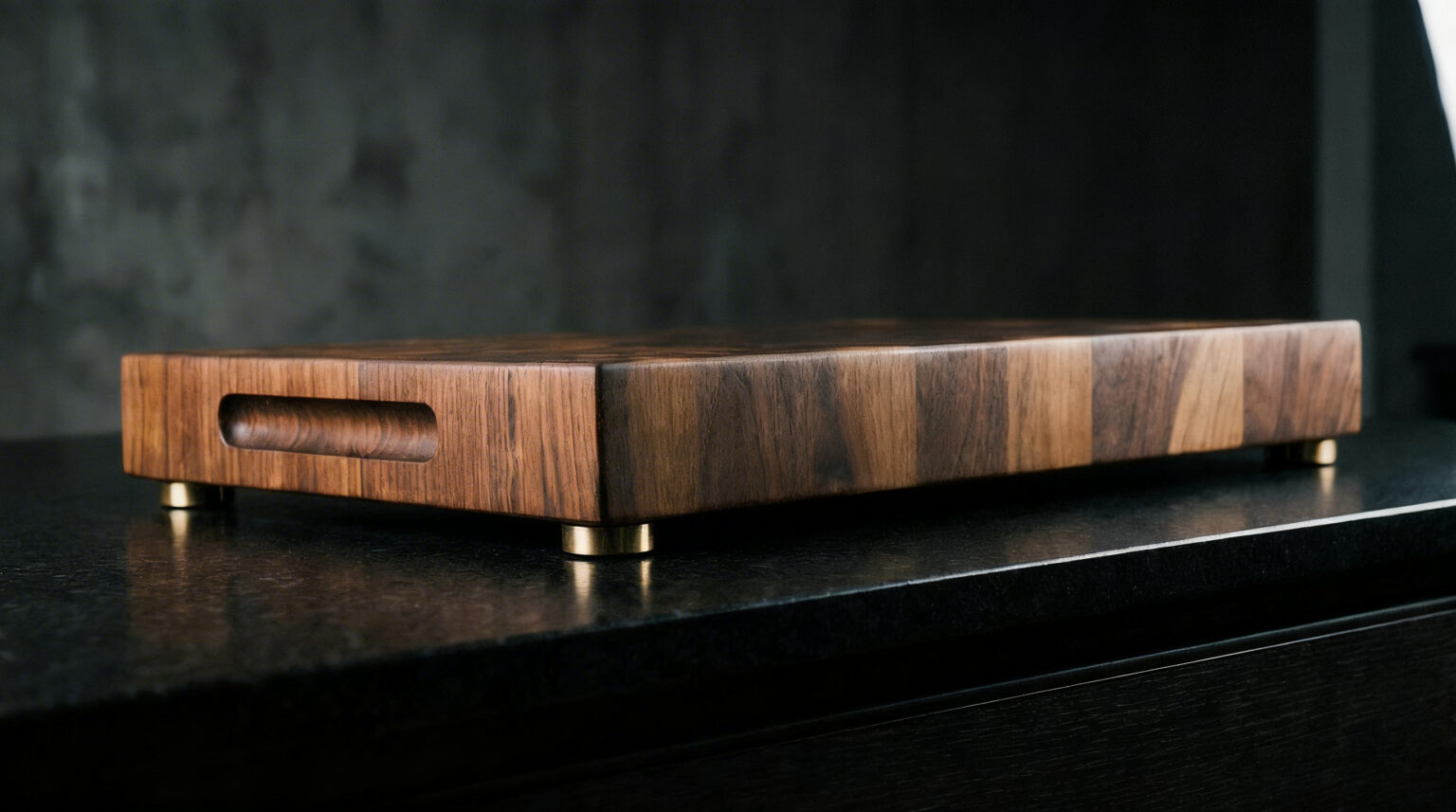 End grain walnut serving board with brass bun feet, hand-finished