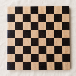 End-grain wenge and Lati chess board, 18 inch, top-down on off-white linen — handmade in Canada by Northern Prairie Woodworks